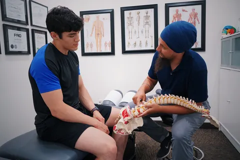 Chiropractor supporting back and mobility care needs